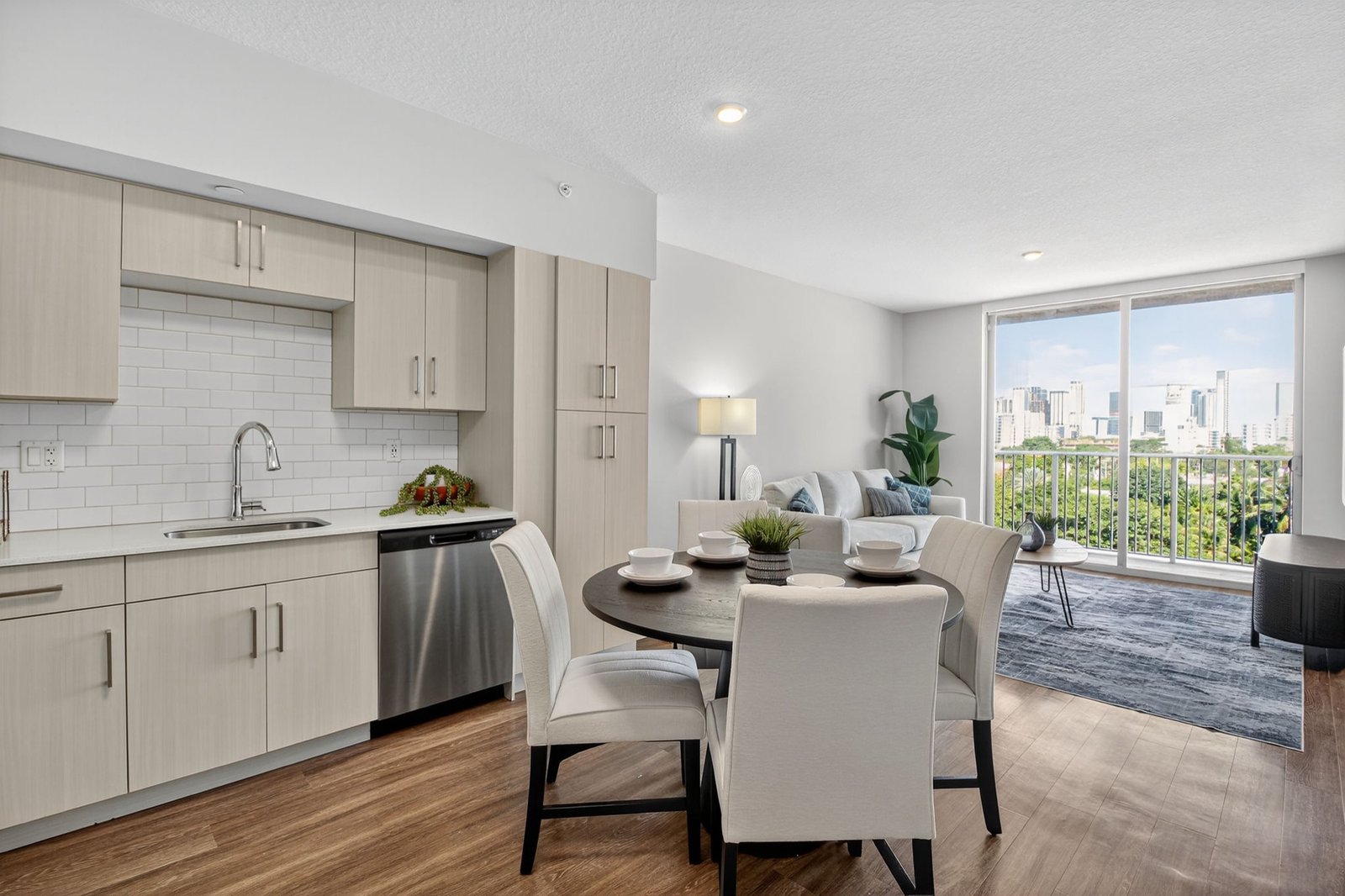 Open kitchen with white quartz countertops