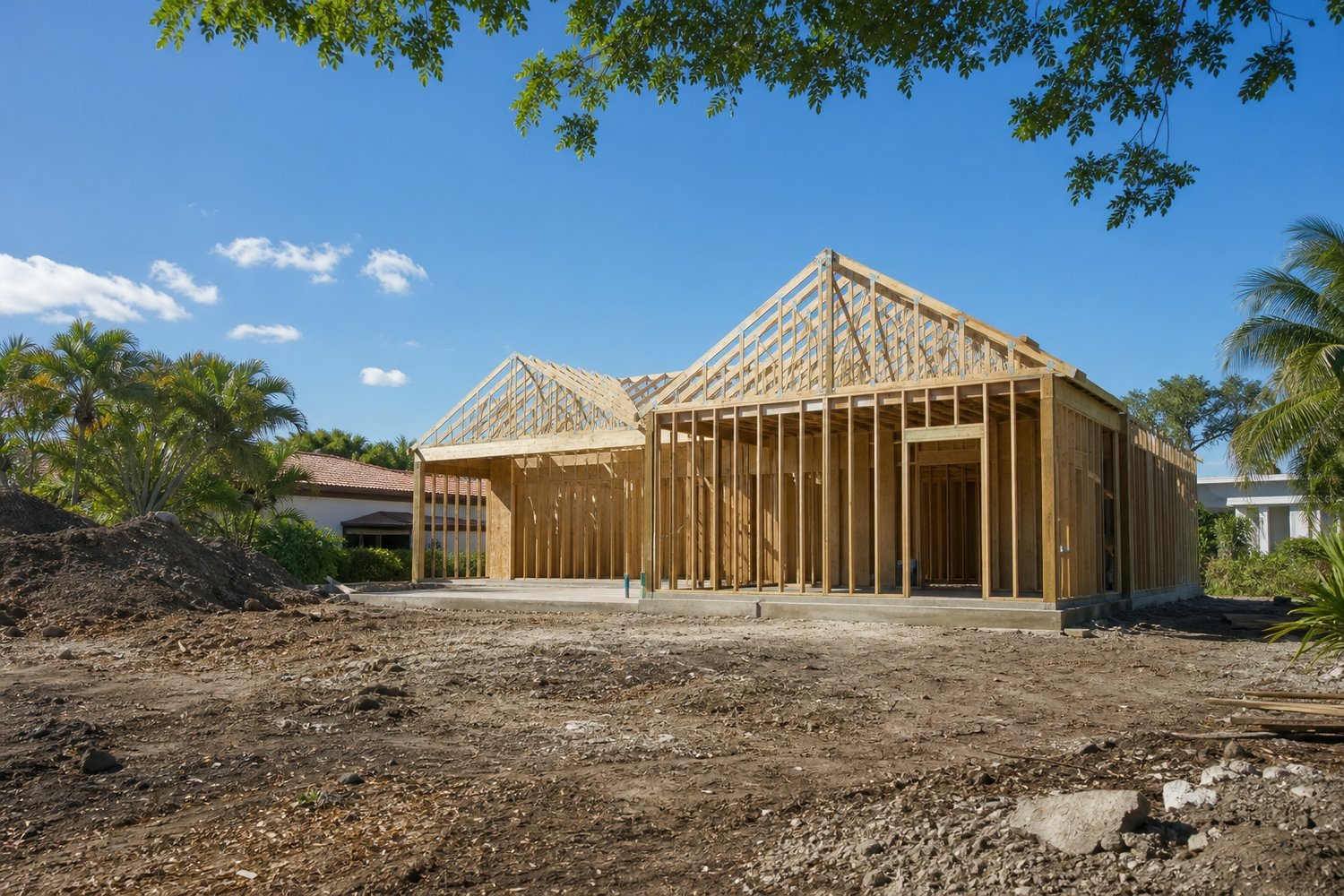 A house under construction, still framed in timber in kendall, FL — Investment Strategies in East Kendall