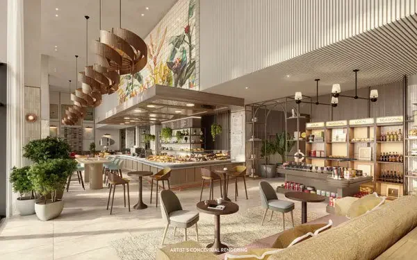 Café con barista y mercado gourmet en el lobby